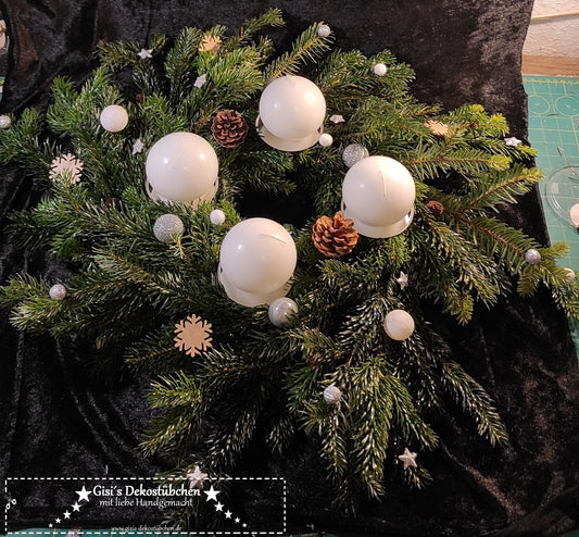 Advent wreath freshly tied white, silver, natural