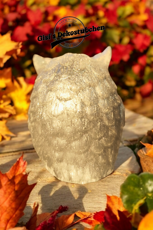 Owl figurine made of synthetic resin