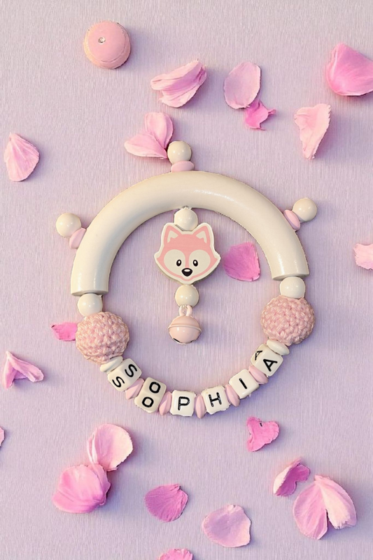 Grasping toy with fox and crochet bead