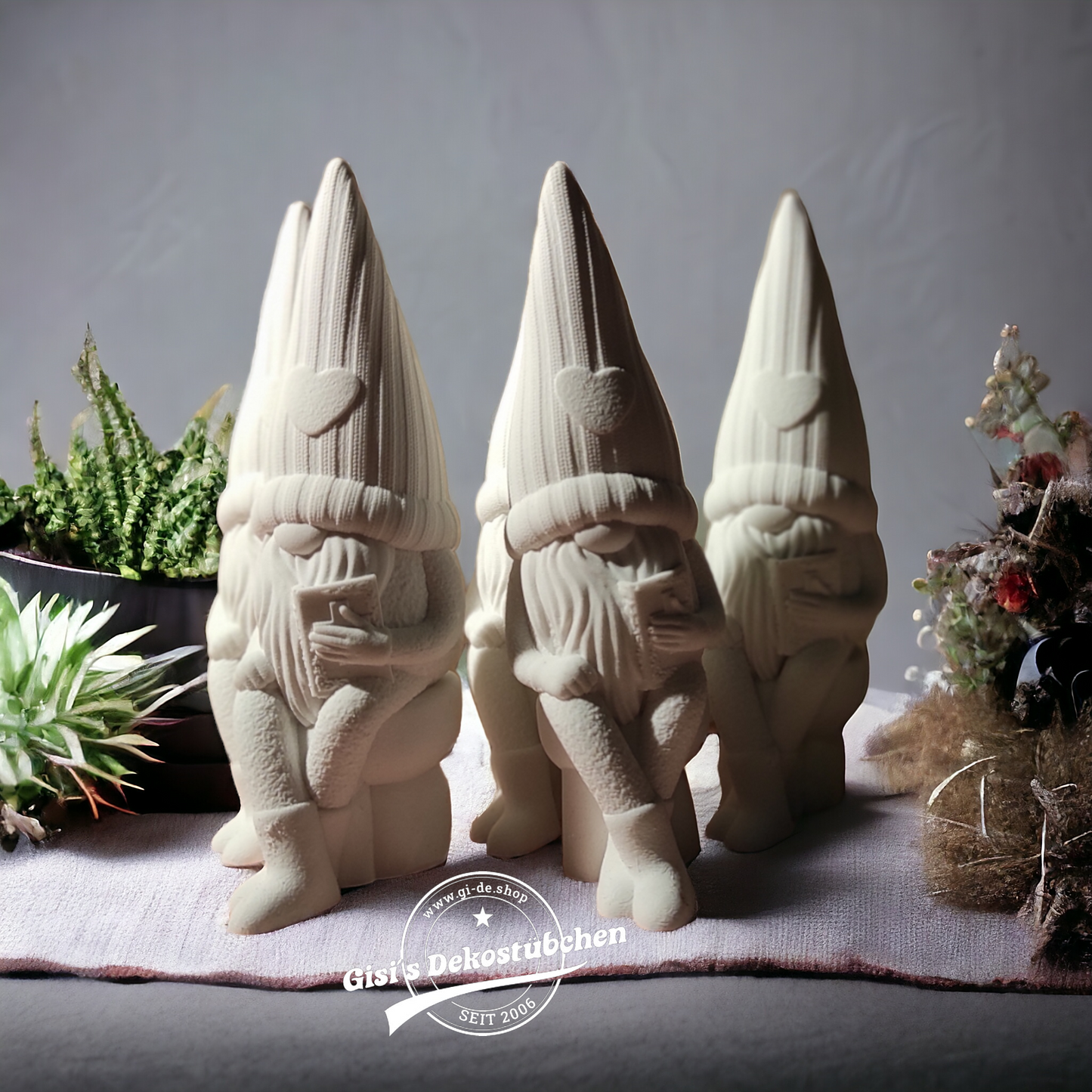 Ceramic gnome No. 1 sitting with heart