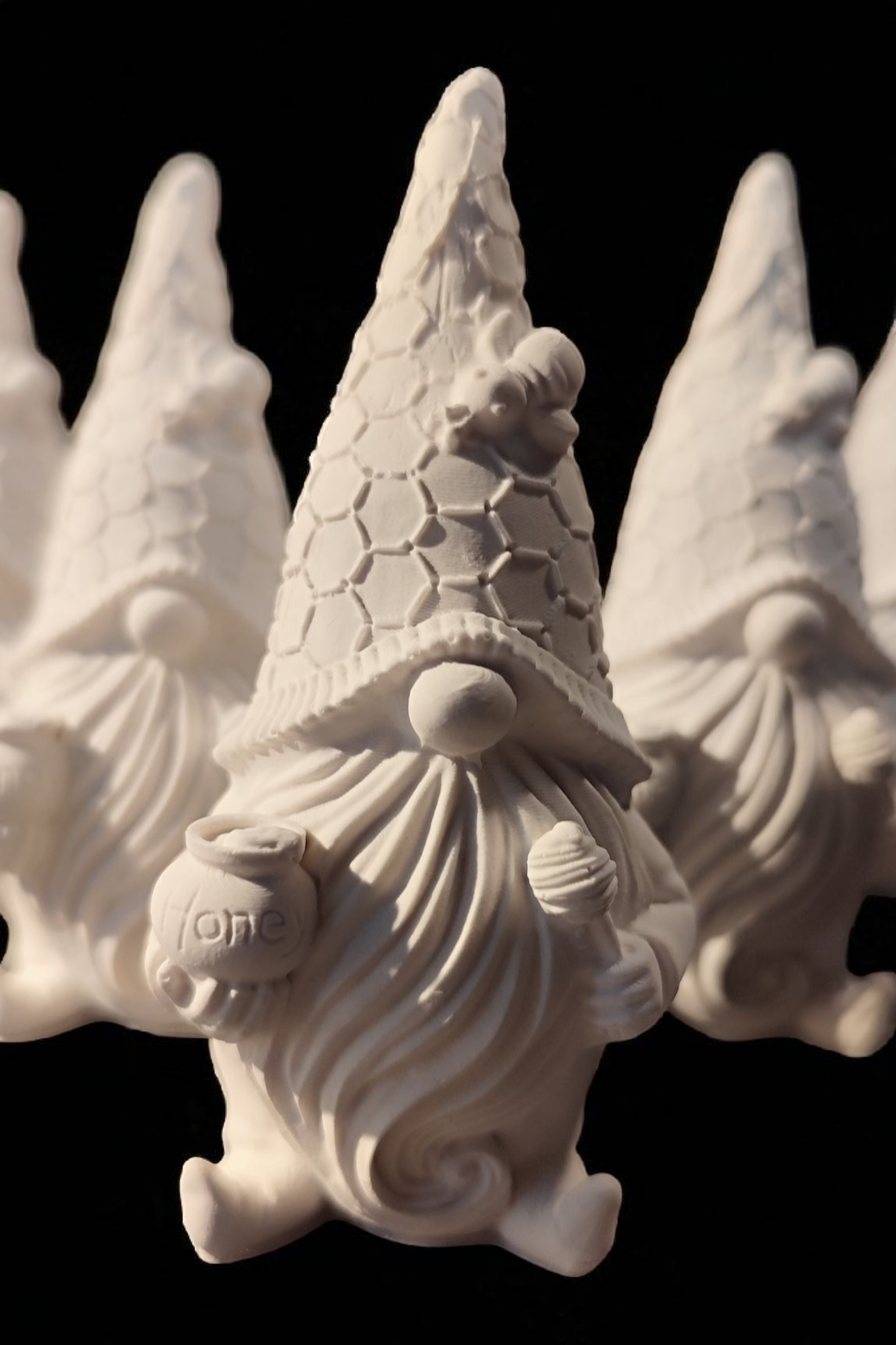 Ceramic gnome with bee and honey