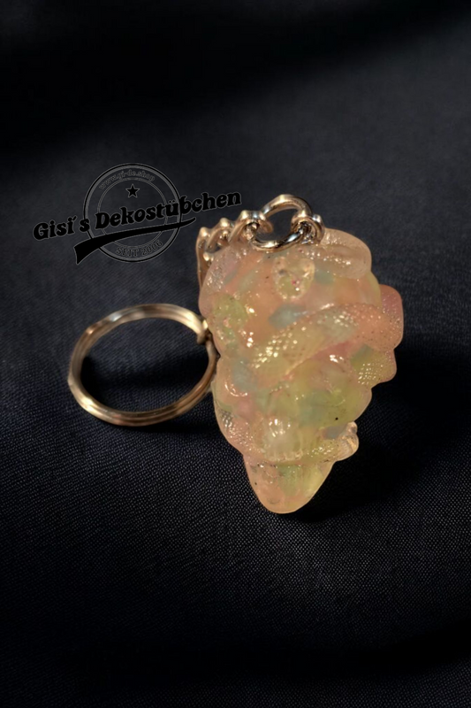 Glowing skull with snakes