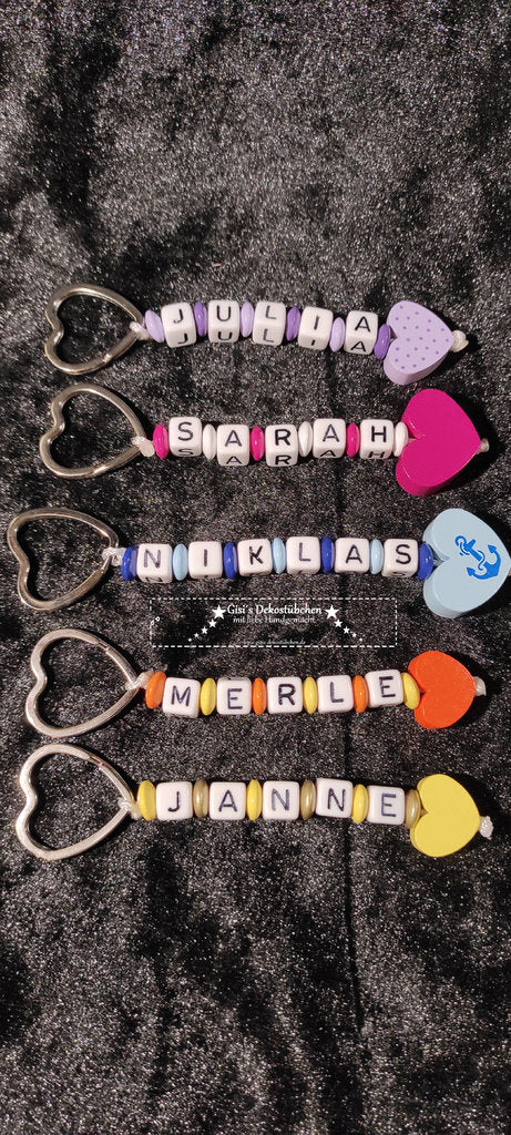 Keychains with name and heart motif in various colors