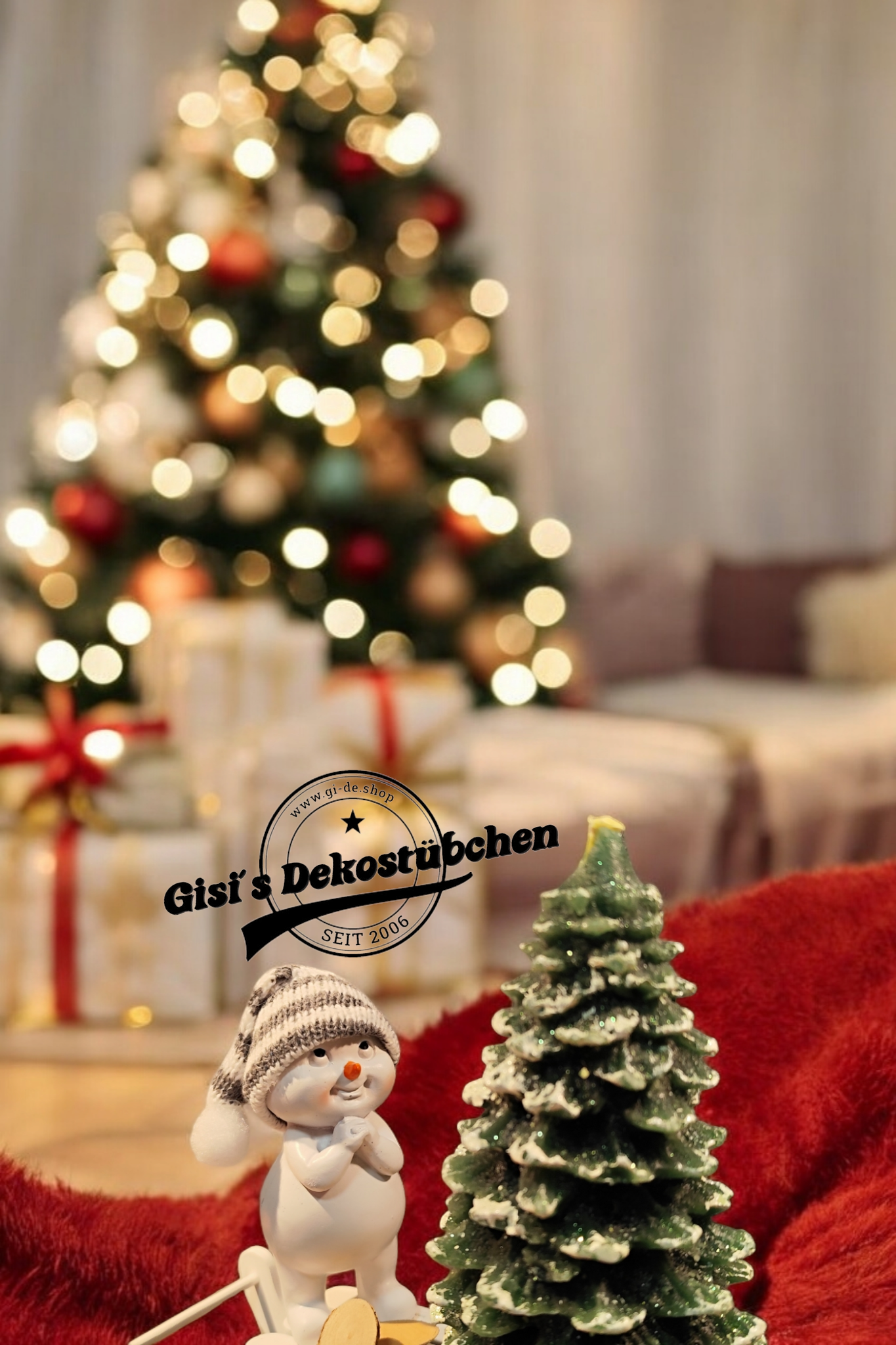 Christmas decorations with sled, snowman, Christmas tree candle and green wooden slices