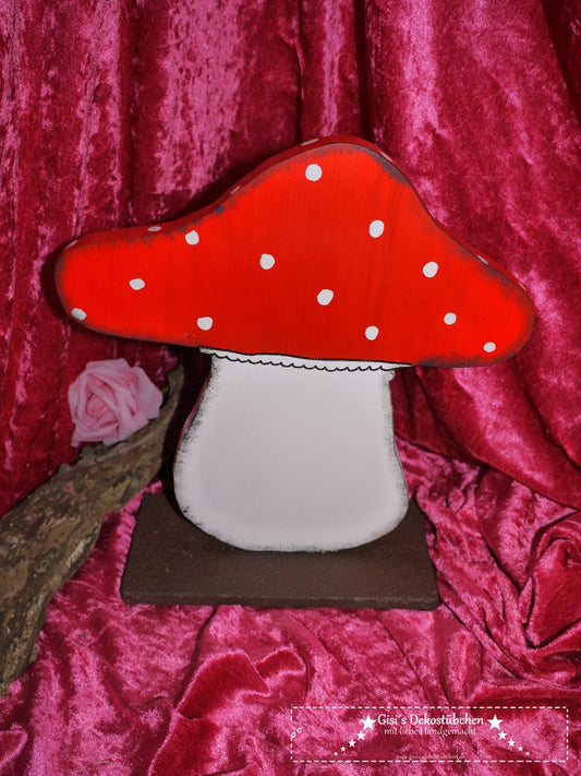 Wooden fly agaric mushroom in shabby chic style