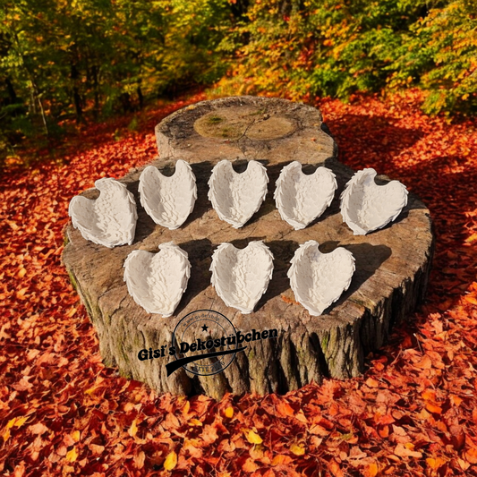 Ceramic wings used as a bowl or storage container