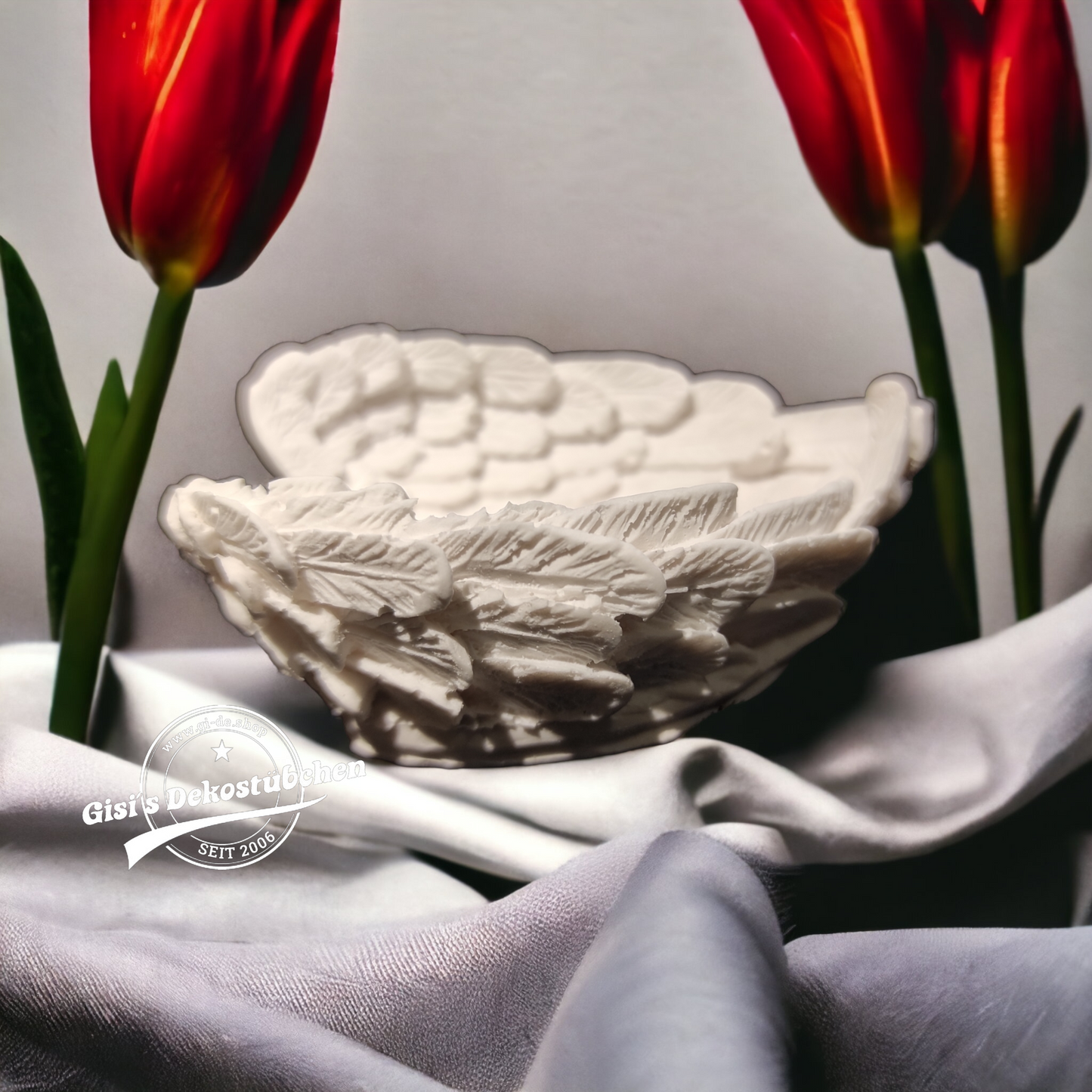 Ceramic wings used as a bowl or storage container