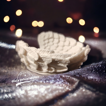 Ceramic wings used as a bowl or storage container