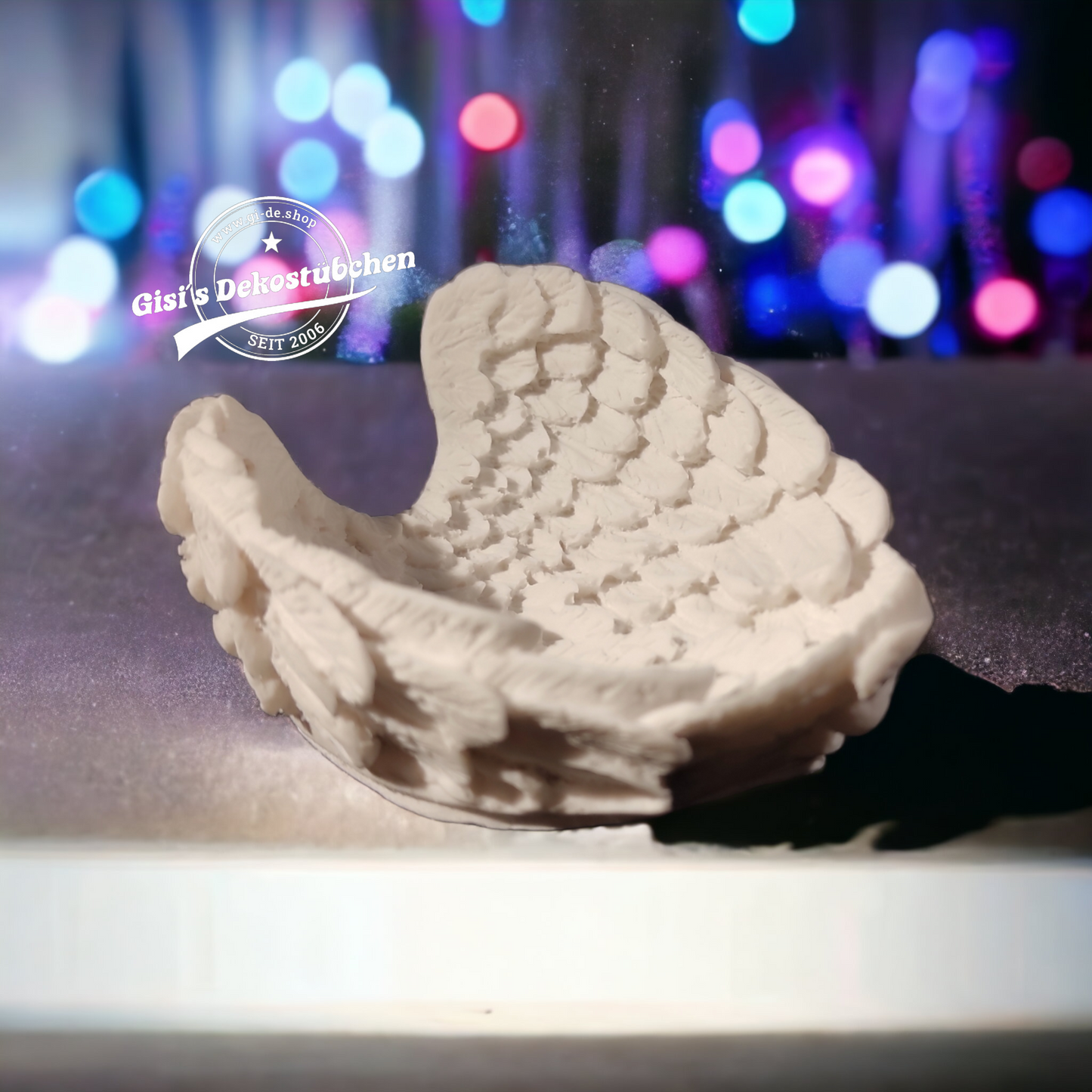 Ceramic wings used as a bowl or storage container