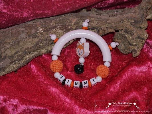 Grasping toy with fox and crochet bead 