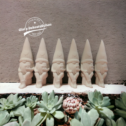 Ceramic gnome No. 1 sitting with heart