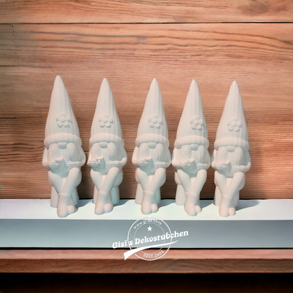 Ceramic gnome no. 4 sitting with cup and flower