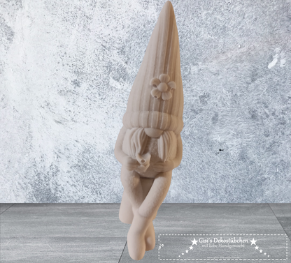 Ceramic gnome no. 4 sitting with cup and flower