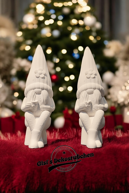 Ceramic gnome no. 4 sitting with cup and flower