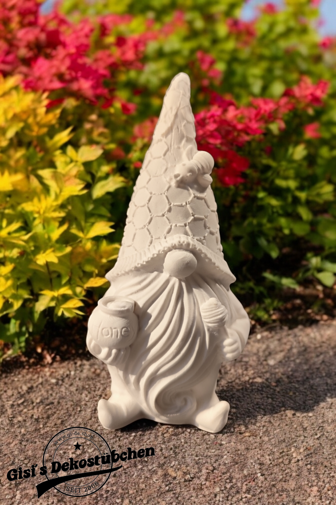 Ceramic gnome with bee and honey