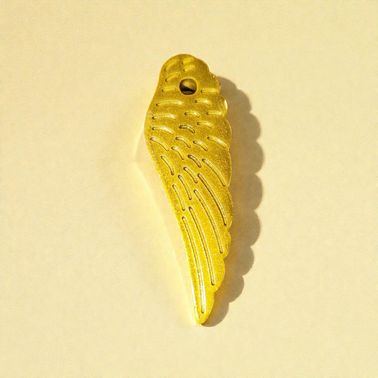 Small ceramic wings in gold or silver