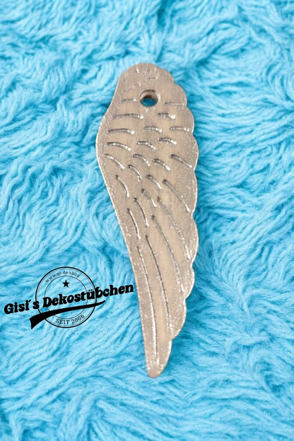 Small ceramic wings in gold or silver