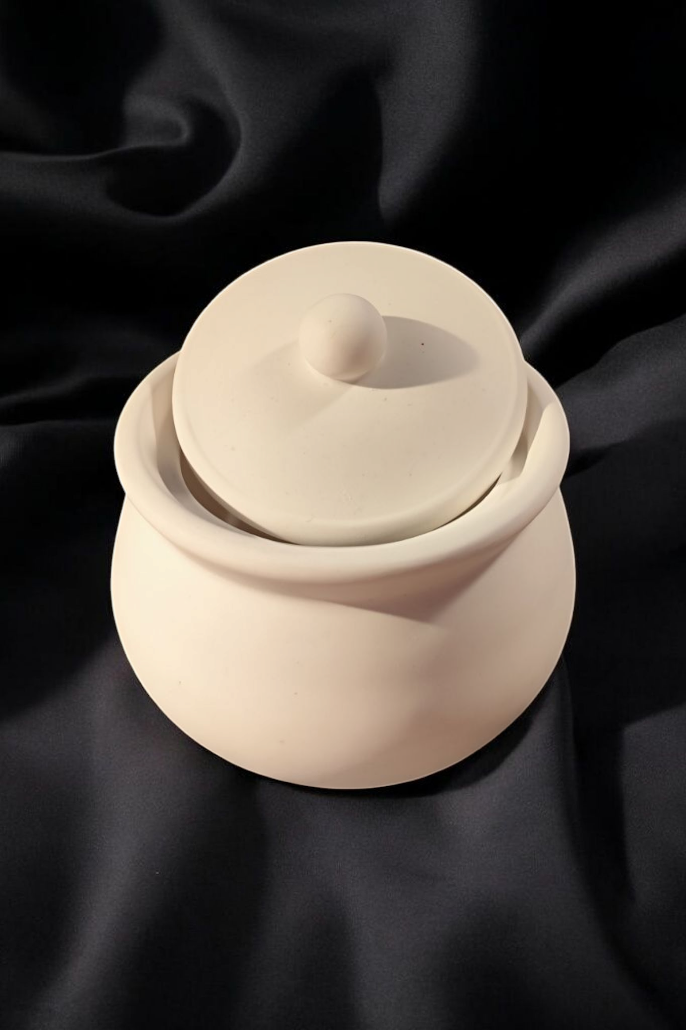 Lovingly crafted ceramic jar with lid