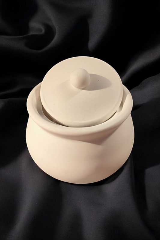 Lovingly crafted ceramic jar with lid