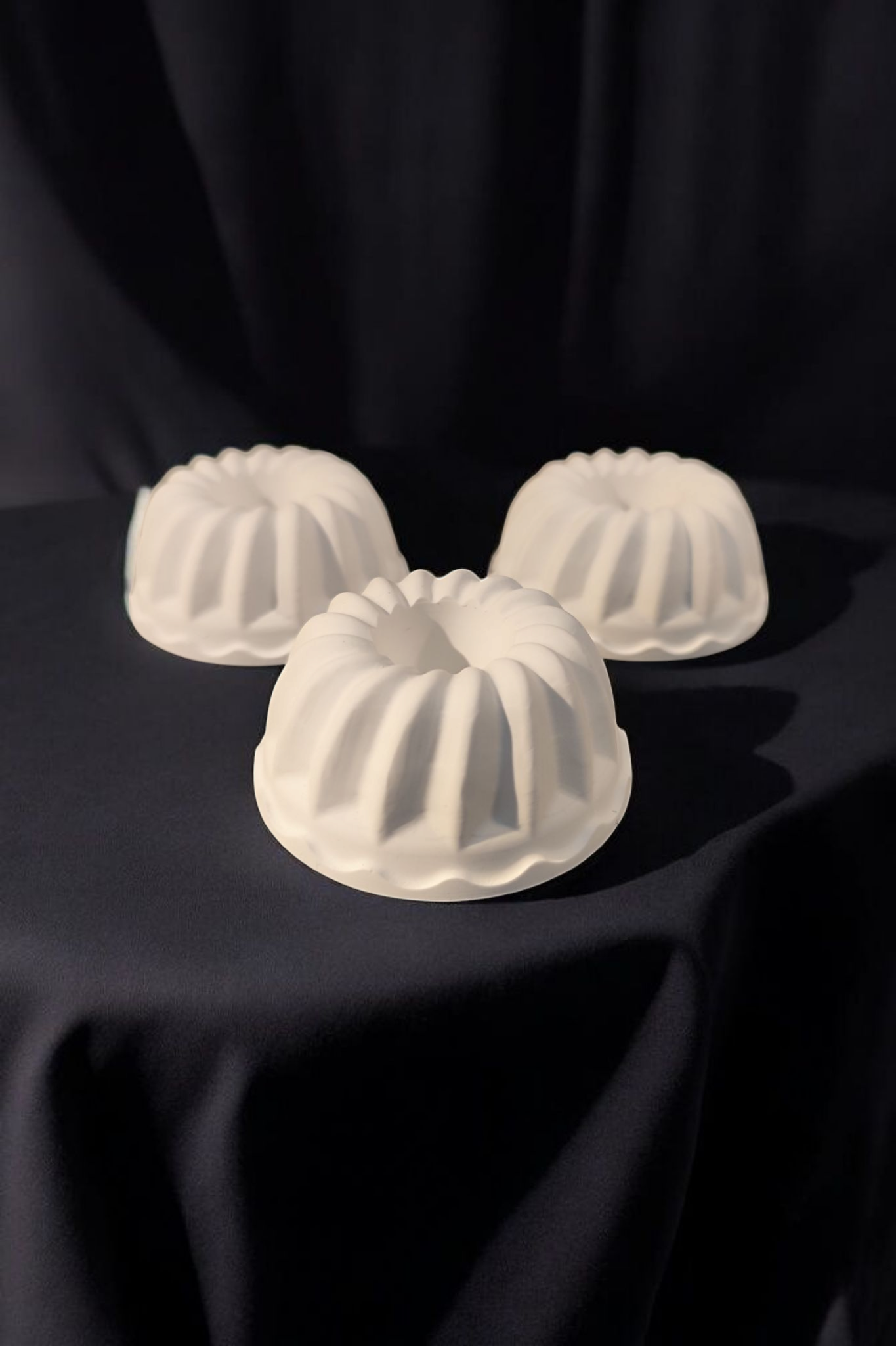 Mini Bundt cake, candle holder, slice of cake