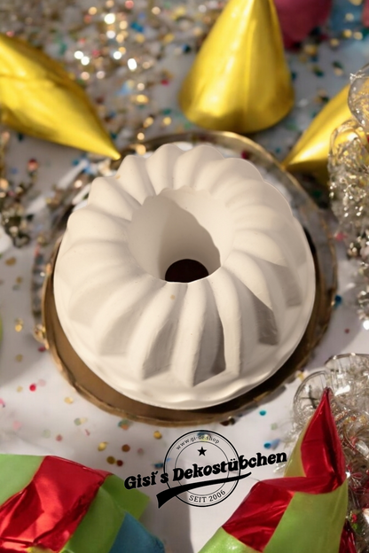 Mini Bundt cake, candle holder, slice of cake