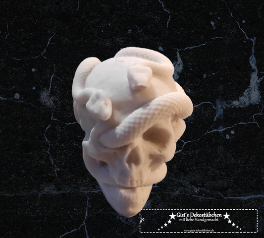Mini ceramic skull with snakes