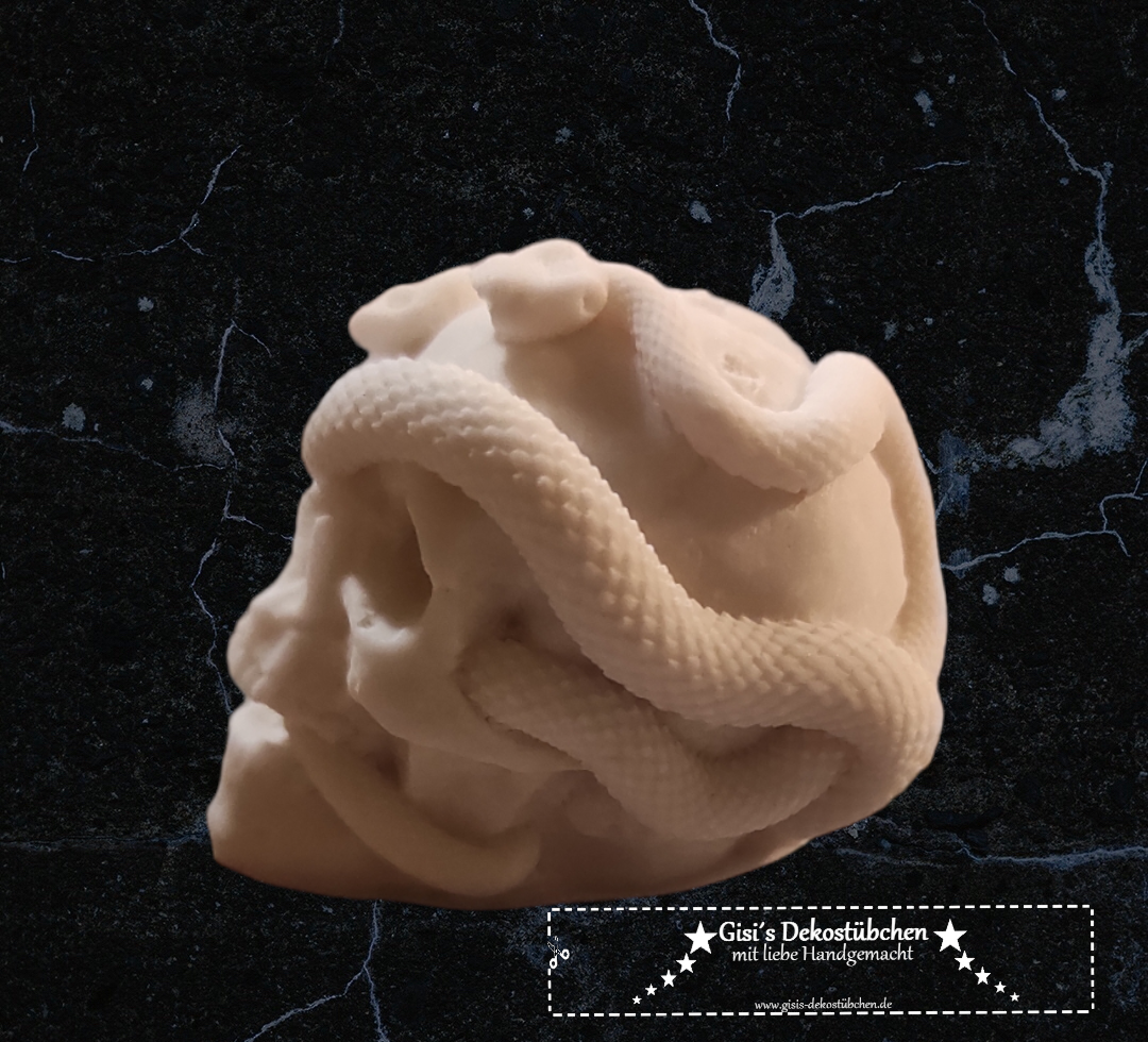 Mini ceramic skull with snakes