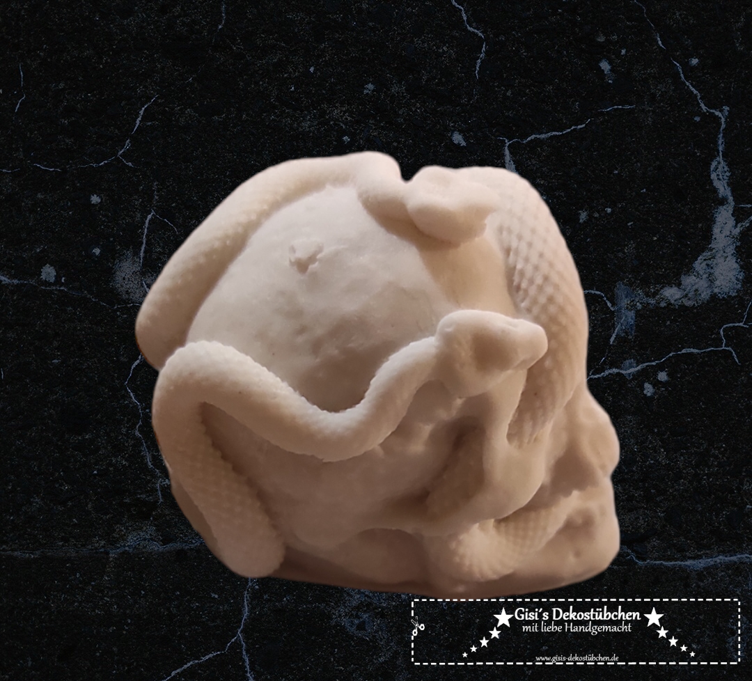Mini ceramic skull with snakes