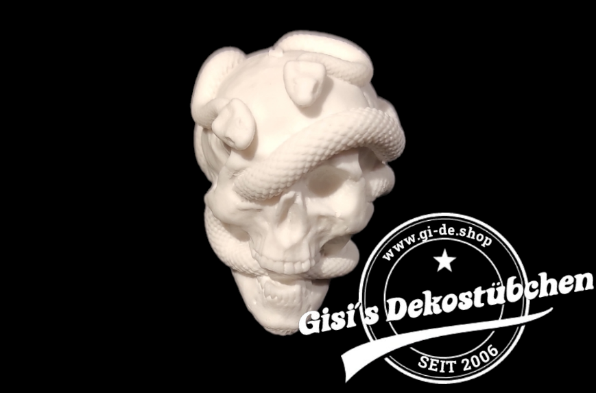 Mini ceramic skull with snakes