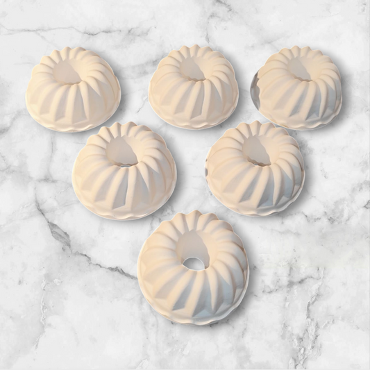 Mini Bundt cake, candle holder, slice of cake