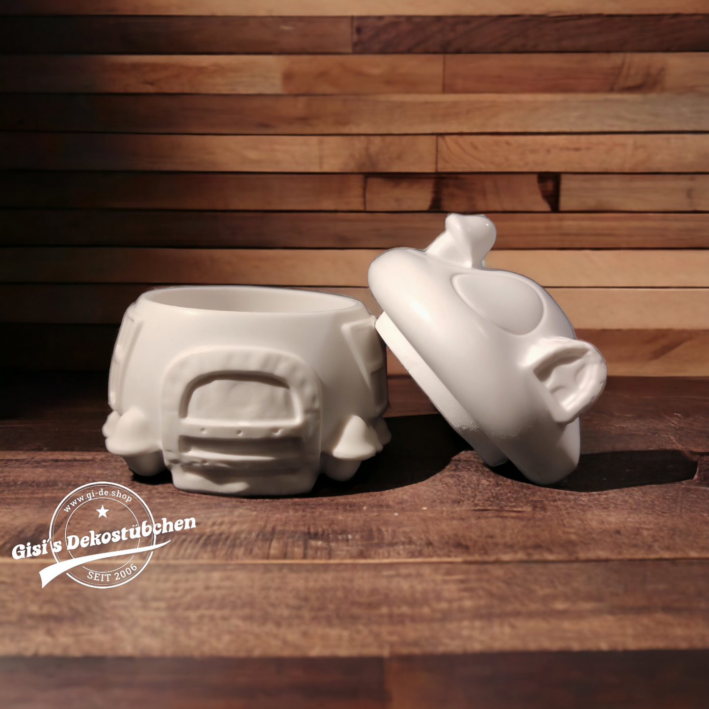 Cute ceramic mushroom in the shape of a box with a door and chimney.