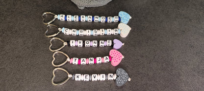 Keychains with name and heart motif in various colors 