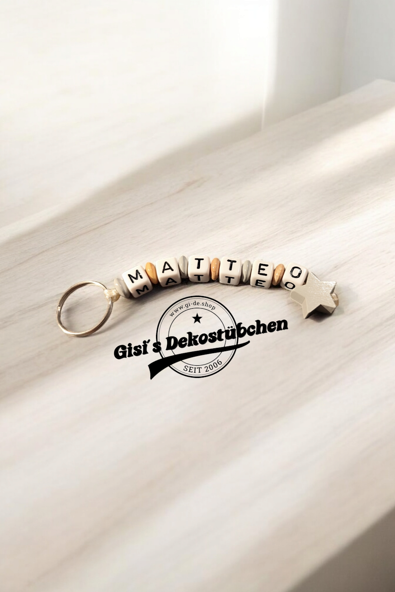 Keychain with name motif star