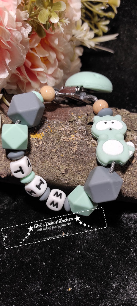 Silicone pacifier chain, raccoon design, grey/mint