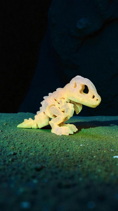 Tiny skeleton of a T-Rex fidget decoration