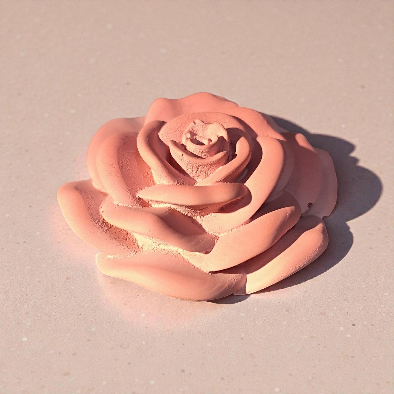 Beautiful ceramic rose in pastel colors